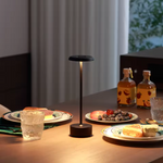 Touch control LED desk lamp featuring three adjustable light color modes.