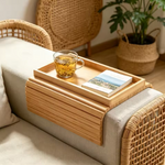 Bamboo sofa armrest tray organizer designed to keep everyday essentials within reach.