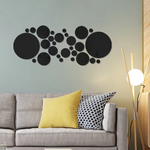 Decorative round mirror wall accents for a modern living room.
