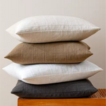 Plaid decorative cushion cover styled on a living room sofa