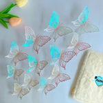 3D paper butterfly decorations arranged on a bedroom wall