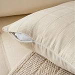 Farmhouse-style plaid cushion cover for a bedroom or accent chair
