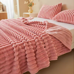Soft striped faux rabbit fur flannel blanket for a cozy home.